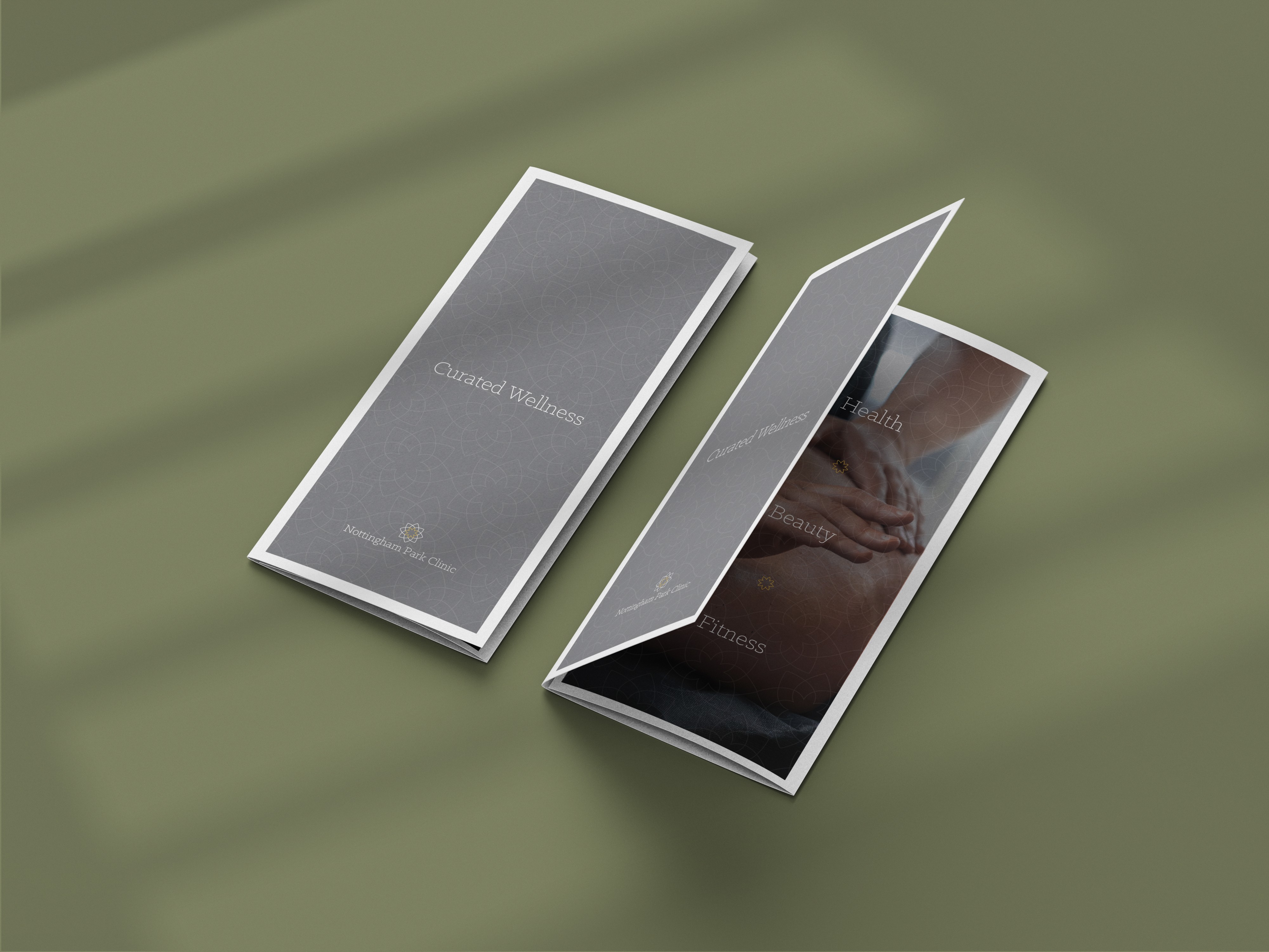 Stationery design of letterhead and business cards for the company Anders on top of a blurred photo of a house interior.