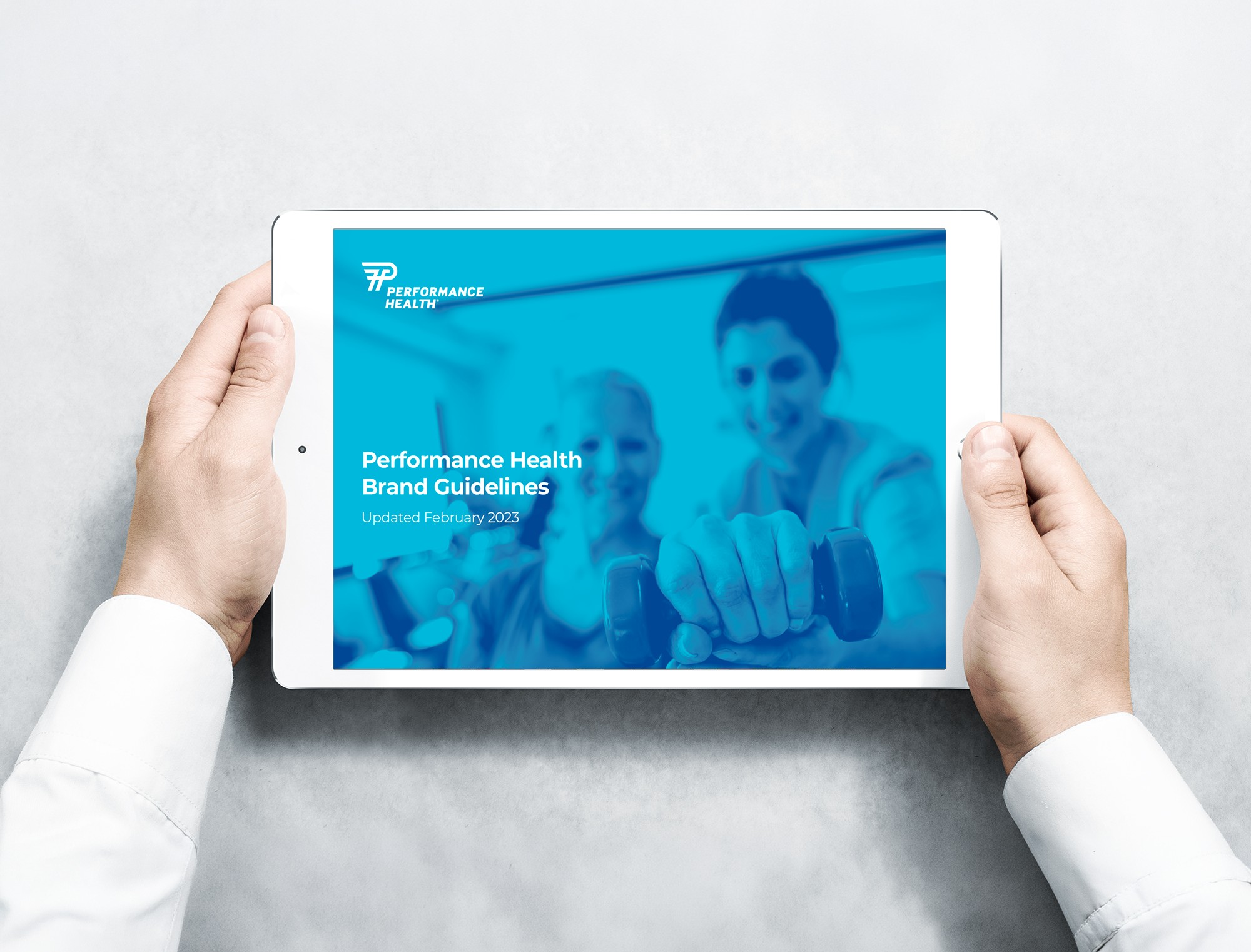 Stylized blue and pink image of a whiskey glass with the wordmark of Vèloce in pink all-caps letters above.